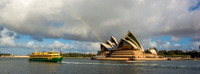 Panoramic view of Sydney Harbour featuring the Sydney Opera House, harbour ferries and the Sydney waterfront, New South Wales, Australia